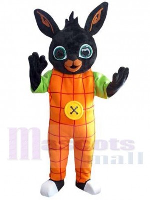 Schwarzer Osterhase Maskottchen-Kostüm Tier in orangefarbenen Latzhosen