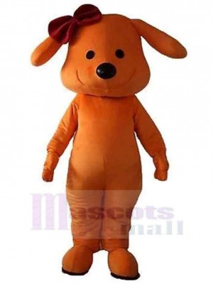 Lächelnder orangefarbener Hund Maskottchen Kostüm Tier mit einem Knoten auf dem Kopf